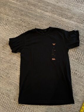 Black crows skis Short-Sleeve Graphic Crewneck T-Shirt with Subtle Orange Accent